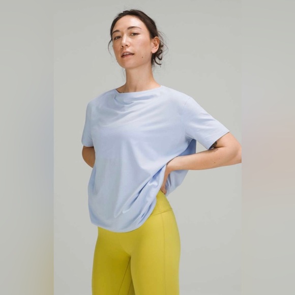 lululemon athletica Tops - Lululemon Nulu Back in Action Short Sleeve
Light blue shirt 
Size 6